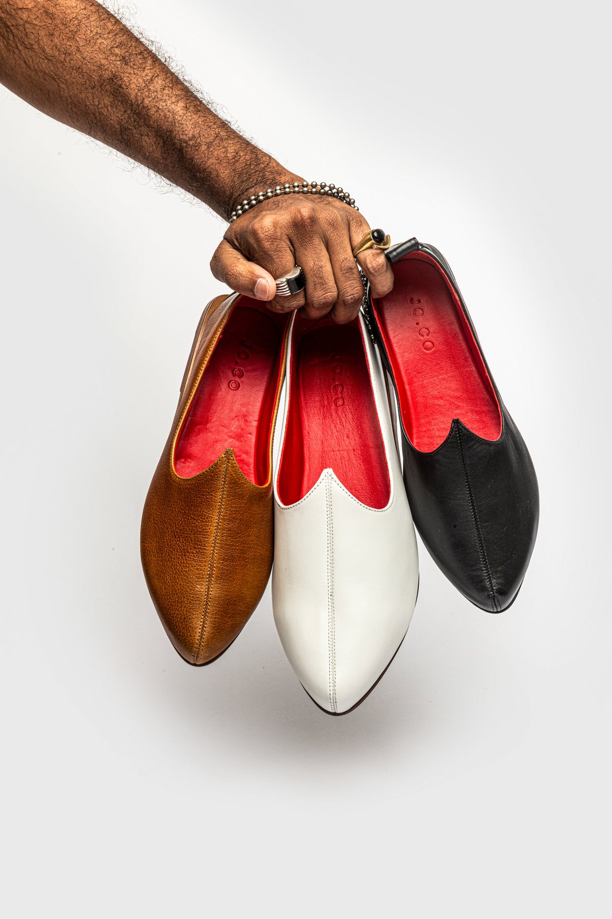 Royal Mojri loafers in black, white and brown calfskin leather.