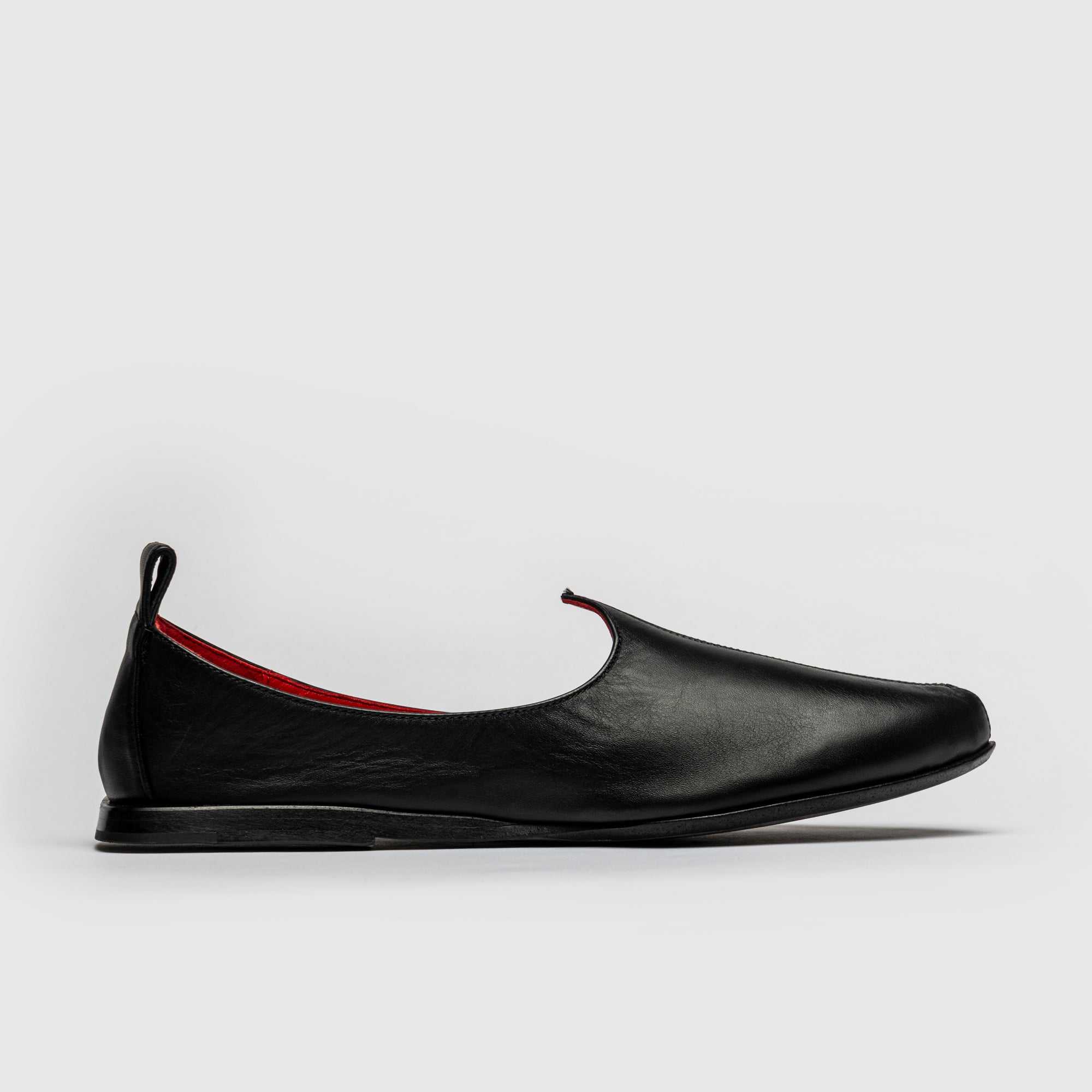 Men's black loafers inspired by Rajasthani Mojris, handcrafted Italian leather shoes with elegant finish