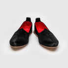 Pair of JOCO Austin Mojri (jutti) loafers in black pony hair calfskin with red lambskin lining, handmade in Italy