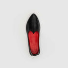 Top view of JOCO Jodhpur women's black calfskin Mojri loafer showing the red lambskin lining