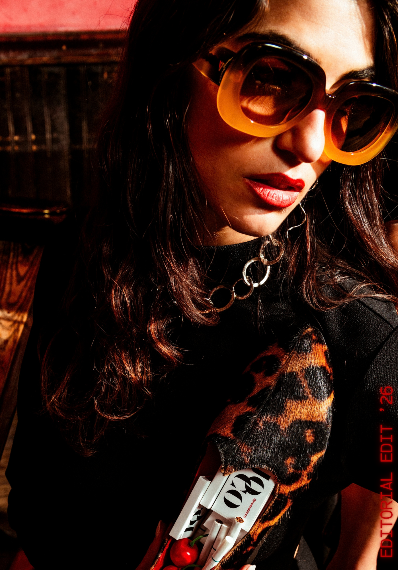 Woman in amber sunglasses holding a JOCO leopard pony hair luxury jutti, JOCO Editorial Edit 2026